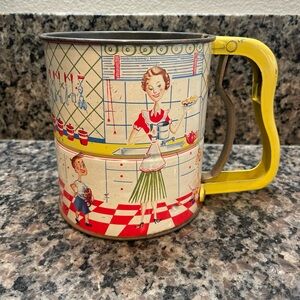 Vintage Kitchen Sifter with Yellow Handle